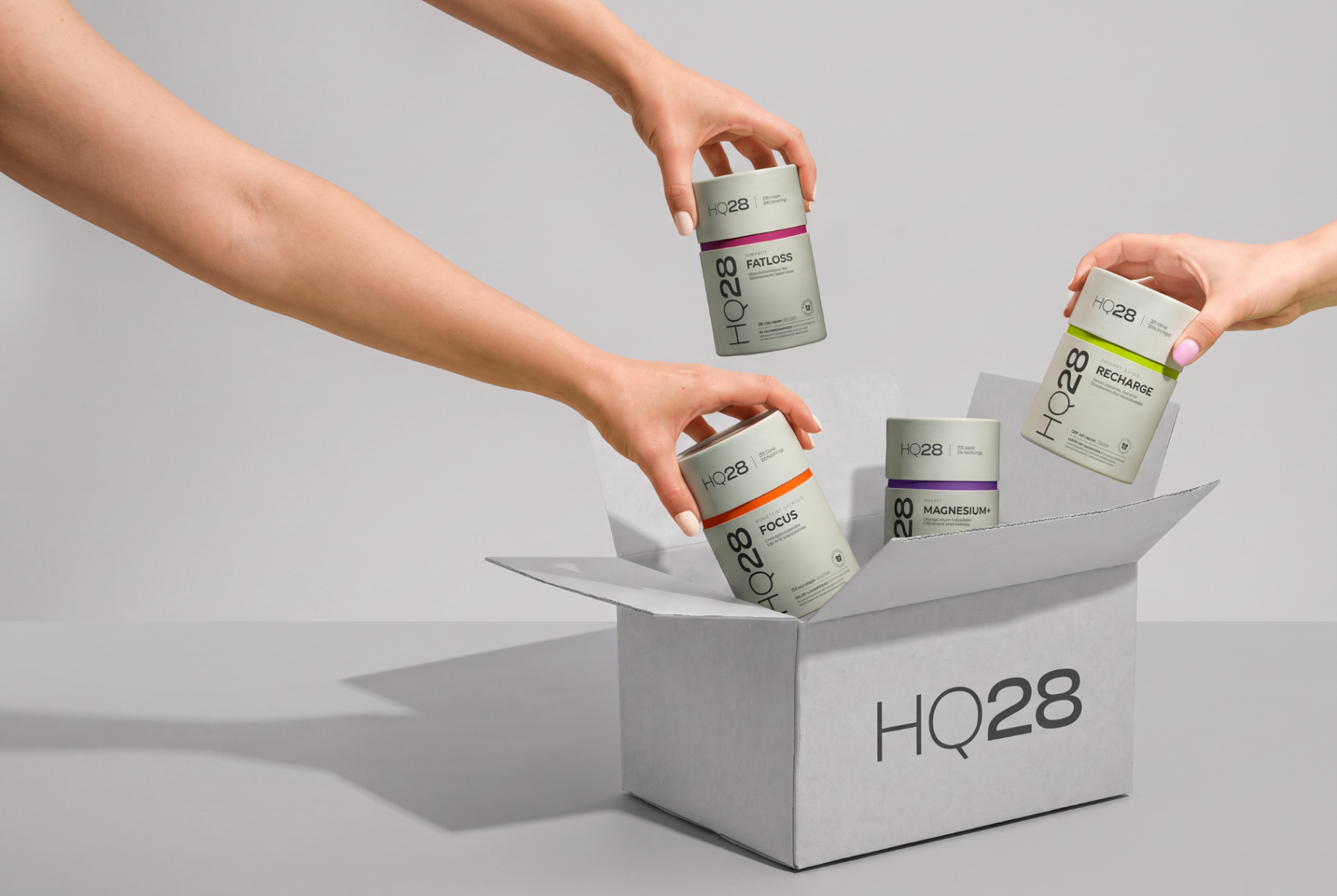 HQ28 formulas being packed into a box